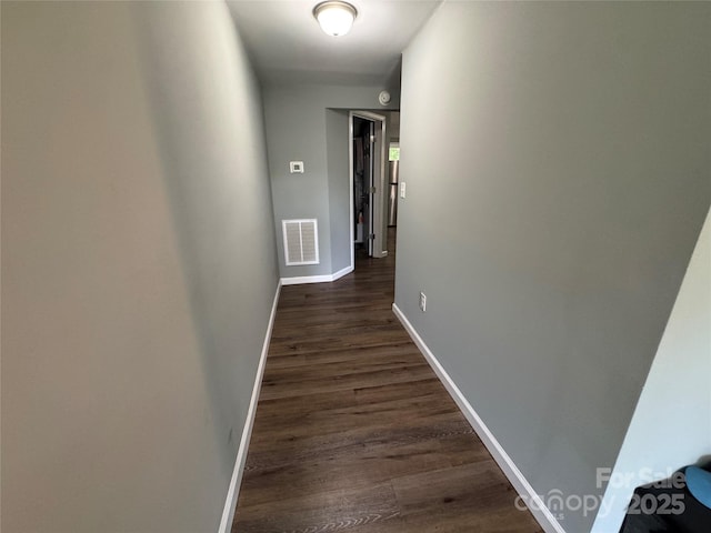 1010 Tennessee St, Kannapolis, NC 28083 - corridor with dark wood-style floors and baseboards