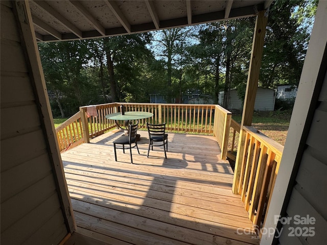 1010 Tennessee St, Kannapolis, NC 28083 - wooden terrace with view of scattered trees and an outbuilding