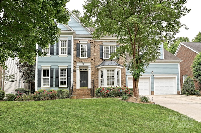 11232 Tradition View Dr, Charlotte, NC 28269 - view of front of home featuring driveway, a front lawn, and brick siding