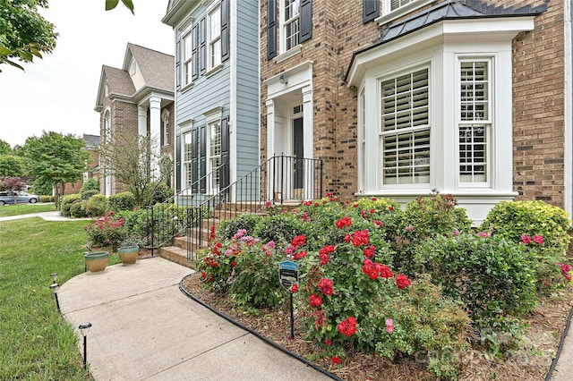 11232 Tradition View Dr, Charlotte, NC 28269 - property entrance featuring brick siding and a yard