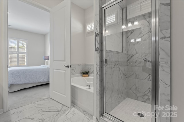 full bath with connected bathroom, a bath, a shower stall, and marble finish floor