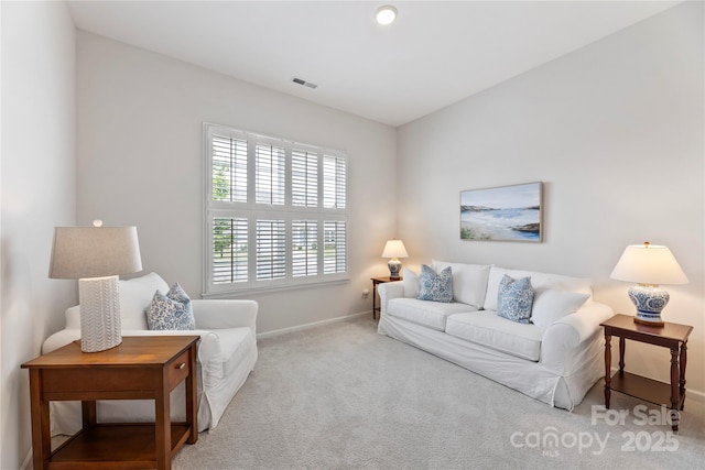 329 Brambling Ct, Wesley Chapel, NC 28110 - carpeted living area with baseboards