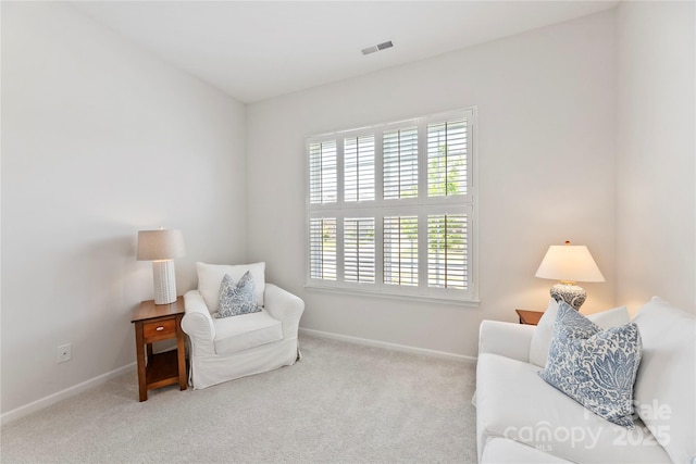 329 Brambling Ct, Wesley Chapel, NC 28110 - living area featuring plenty of natural light, baseboards, and carpet