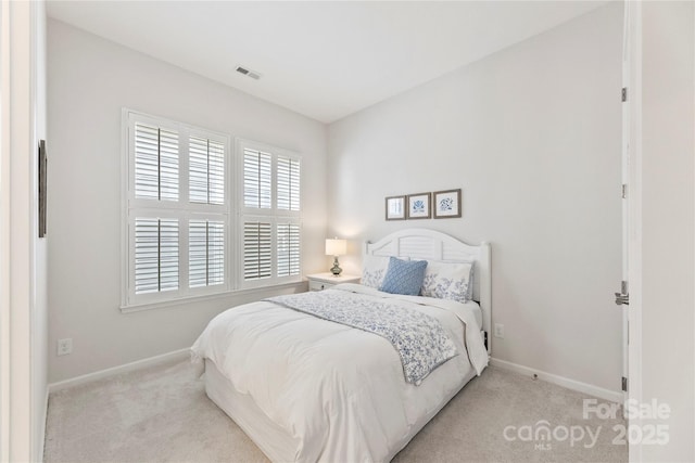 329 Brambling Ct, Wesley Chapel, NC 28110 - bedroom featuring light carpet and baseboards