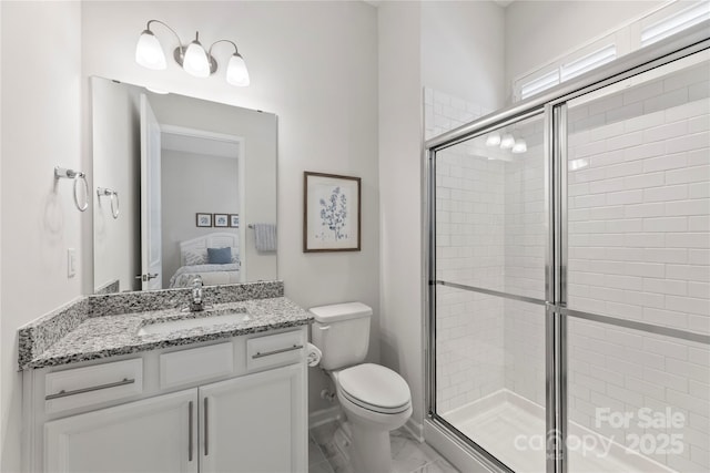 329 Brambling Ct, Wesley Chapel, NC 28110 - bathroom featuring a stall shower, toilet, connected bathroom, and marble finish flooring