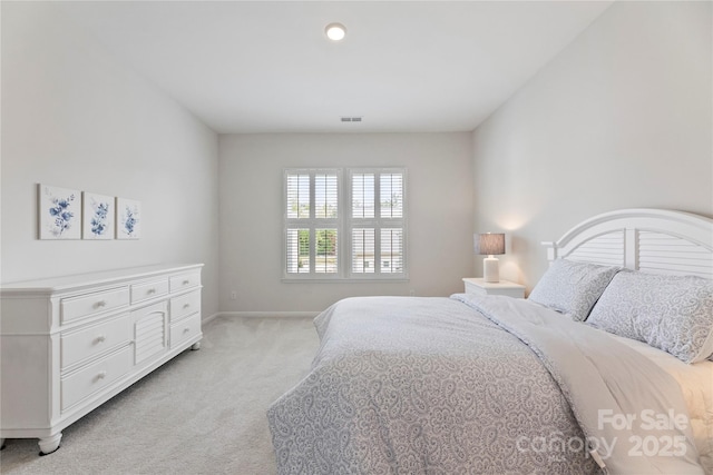 329 Brambling Ct, Wesley Chapel, NC 28110 - bedroom featuring light colored carpet and baseboards