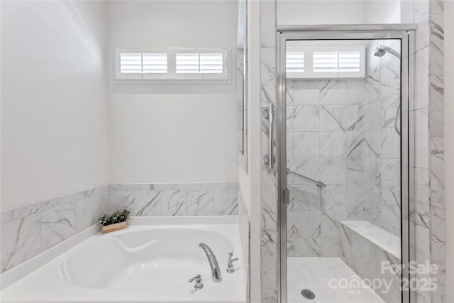 329 Brambling Ct, Wesley Chapel, NC 28110 - bathroom featuring a stall shower and a garden tub