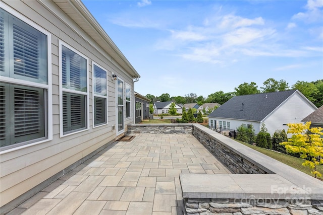 329 Brambling Ct, Wesley Chapel, NC 28110 - view of patio featuring a residential view