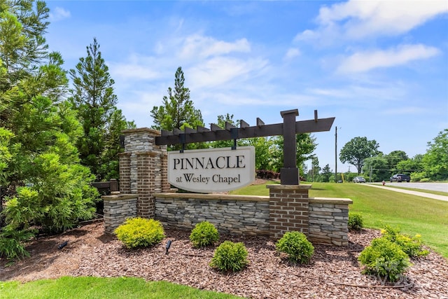 329 Brambling Ct, Wesley Chapel, NC 28110 - community sign with a yard