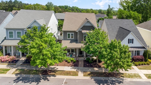 209 Helton Ln, Fort Mill, SC 29708 - view of front of property featuring covered porch, board and batten siding, and a shingled roof