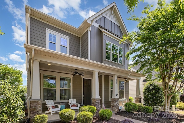 209 Helton Ln, Fort Mill, SC 29708 - craftsman-style house featuring a porch, a ceiling fan, stone siding, and board and batten siding