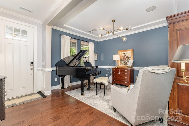 209 Helton Ln, Fort Mill, SC 29708 - living area with visible vents, wood finished floors, crown molding, and a chandelier