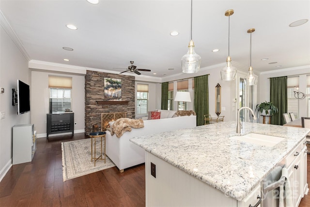 209 Helton Ln, Fort Mill, SC 29708 - kitchen with a healthy amount of sunlight, a center island with sink, ceiling fan, and a sink