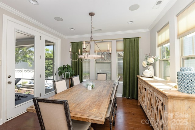 209 Helton Ln, Fort Mill, SC 29708 - dining room with visible vents, ornamental molding, an inviting chandelier, and dark wood-type flooring
