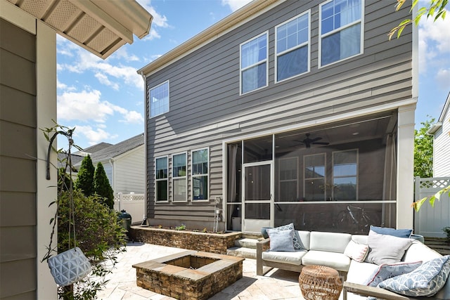 209 Helton Ln, Fort Mill, SC 29708 - back of house featuring an outdoor living space with a fire pit, fence, a sunroom, and a patio area