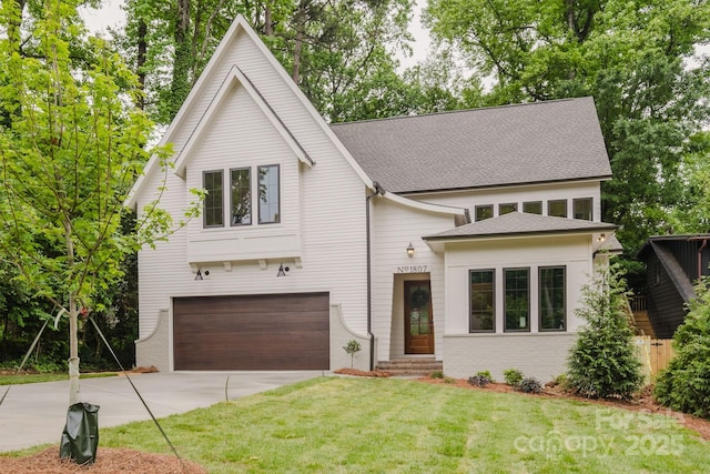 1807 Arnold Dr, Charlotte, NC 28205 - view of front of home featuring concrete driveway, a garage, a shingled roof, and brick siding