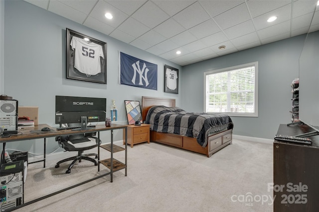 bedroom with baseboards, carpet, recessed lighting, and a paneled ceiling