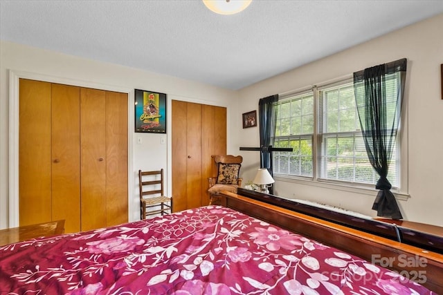 1044 Oakridge Farm Hwy, Mooresville, NC 28115 - bedroom featuring a textured ceiling