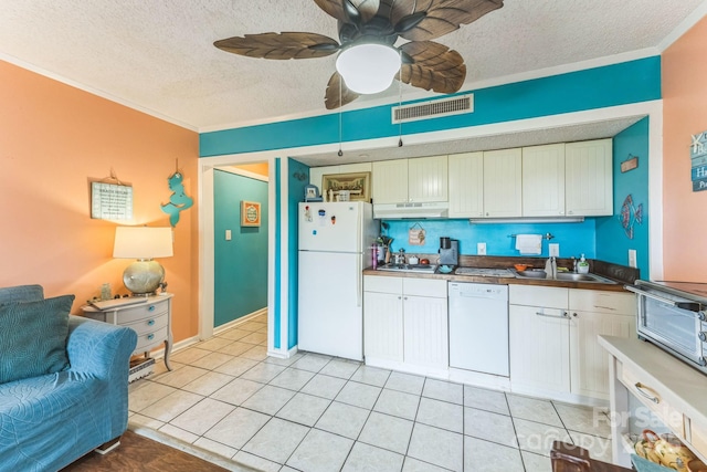 415 Ocean Creek Dr N Unit 2330, Myrtle Beach, SC 29572 - kitchen with white appliances, a textured ceiling, a sink, under cabinet range hood, and crown molding