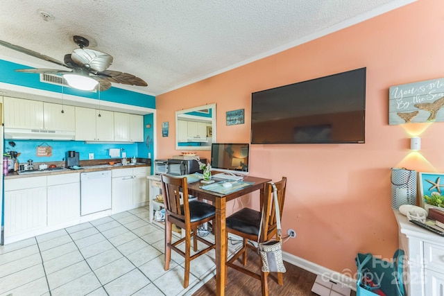 415 Ocean Creek Dr N Unit 2330, Myrtle Beach, SC 29572 - dining space featuring a ceiling fan, a textured ceiling, crown molding, and light tile patterned flooring
