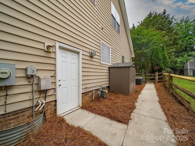 property entrance with fence