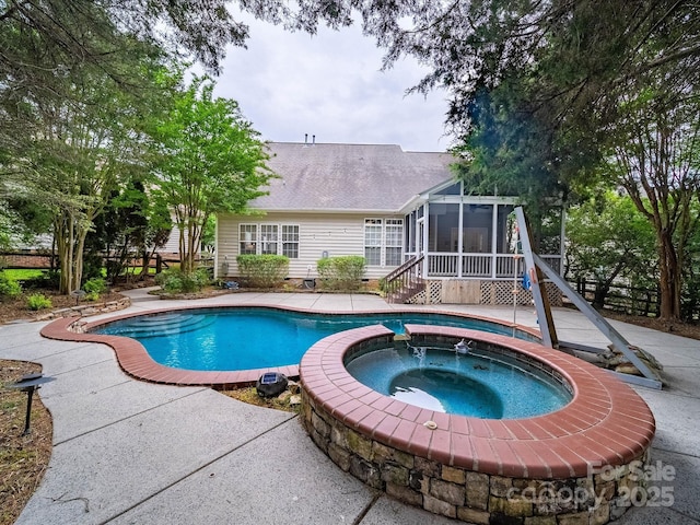 view of pool with stairway, a patio area, a pool with connected hot tub, and a sunroom