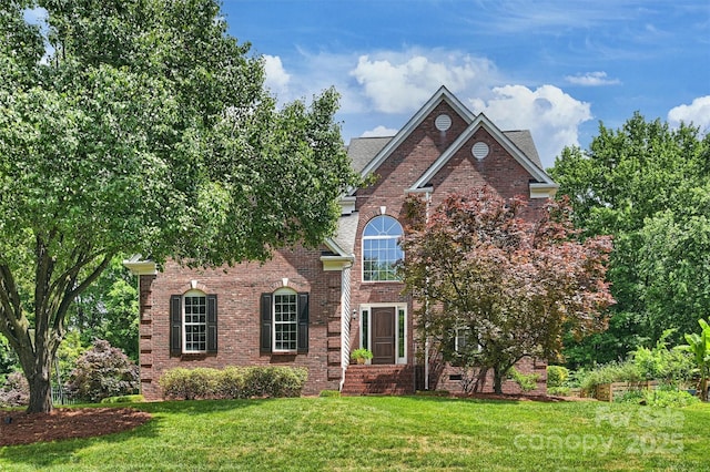 6723 Joliette Ln, Charlotte, NC 28277 - traditional-style home featuring a front yard and brick siding