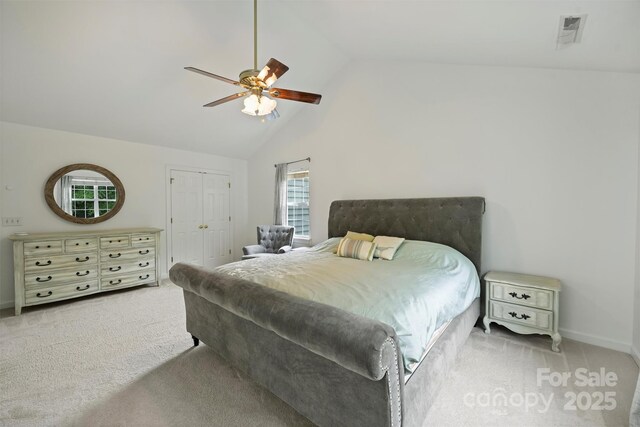 6723 Joliette Ln, Charlotte, NC 28277 - carpeted bedroom with multiple windows, ceiling fan, baseboards, a closet, and high vaulted ceiling