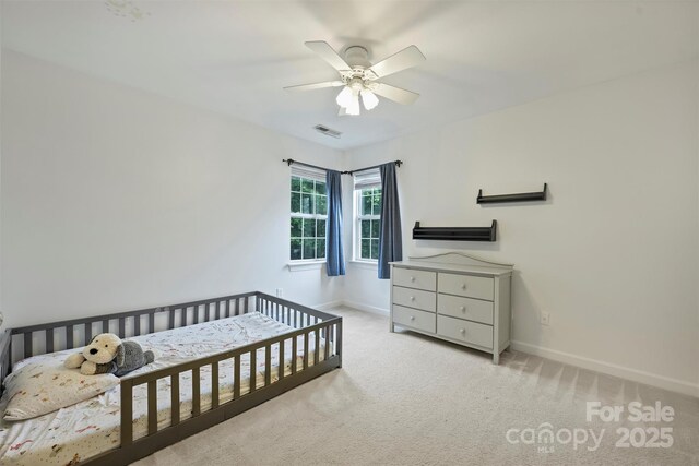 6723 Joliette Ln, Charlotte, NC 28277 - bedroom featuring baseboards, carpet floors, and ceiling fan