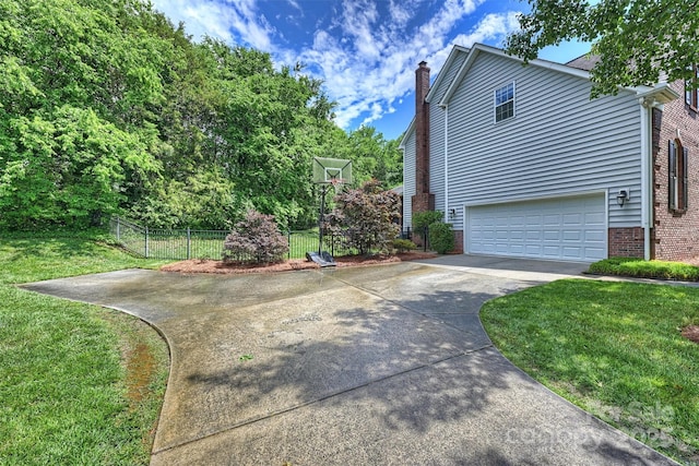 6723 Joliette Ln, Charlotte, NC 28277 - view of side of property with driveway, a chimney, brick siding, and a garage