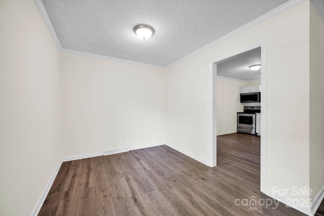 612 Summerow Rd Lot 22, Stanley, NC 28164 - spare room with visible vents, ornamental molding, a textured ceiling, and wood finished floors