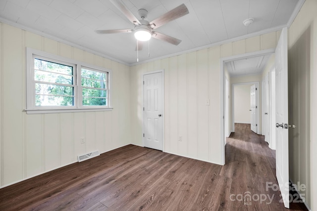 612 Summerow Rd Lot 22, Stanley, NC 28164 - unfurnished bedroom featuring ceiling fan, attic access, visible vents, crown molding, and dark wood-type flooring