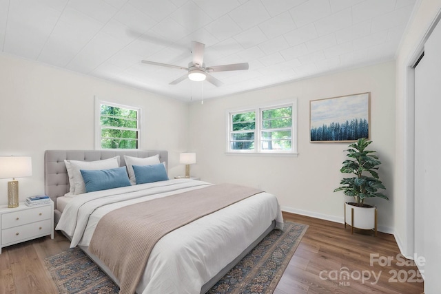 612 Summerow Rd Lot 22, Stanley, NC 28164 - bedroom featuring baseboards, a ceiling fan, and wood finished floors
