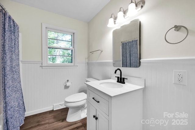 612 Summerow Rd Lot 22, Stanley, NC 28164 - full bathroom featuring vanity, visible vents, wainscoting, wood finished floors, and toilet