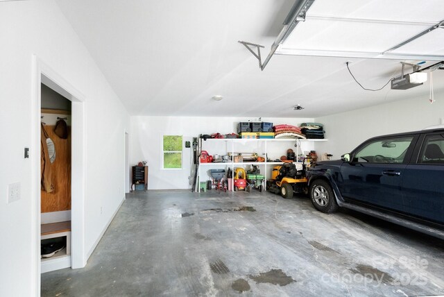 85 Laurel Cove Rd, Candler, NC 28715 - garage with a garage door opener
