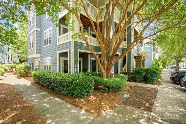 view of property exterior featuring a balcony