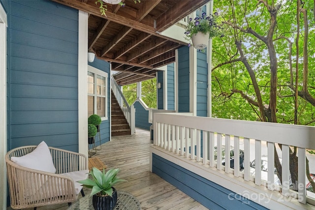 deck featuring stairs