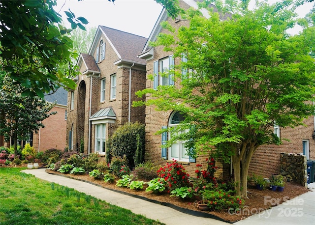 19409 Laurel Glen Ave, Cornelius, NC 28031 - view of home's exterior featuring brick siding