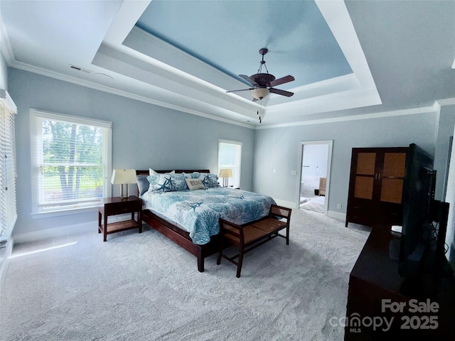 19409 Laurel Glen Ave, Cornelius, NC 28031 - carpeted bedroom with visible vents, crown molding, ceiling fan, a tray ceiling, and baseboards