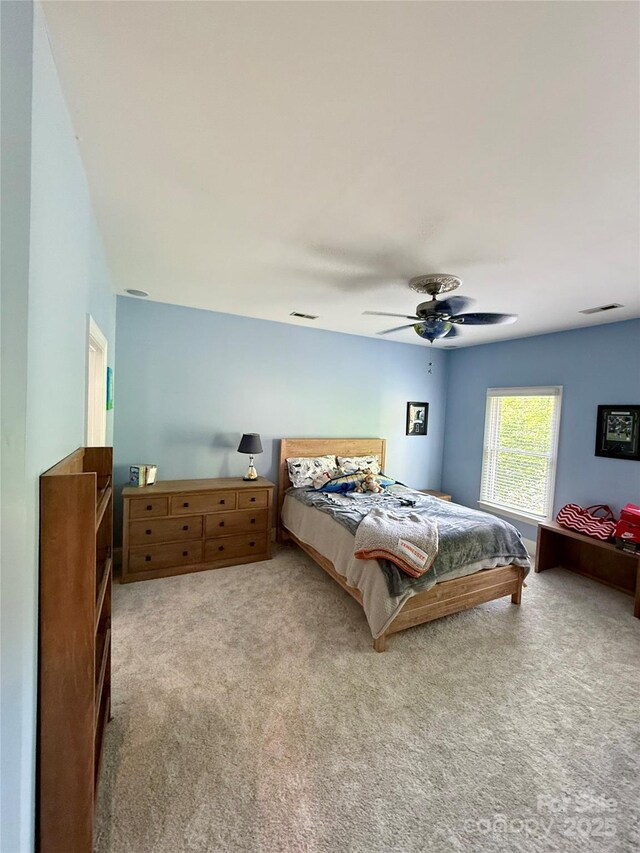 19409 Laurel Glen Ave, Cornelius, NC 28031 - bedroom featuring ceiling fan, visible vents, and carpet