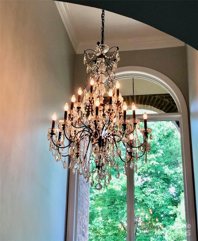19409 Laurel Glen Ave, Cornelius, NC 28031 - interior details featuring an inviting chandelier and ornamental molding