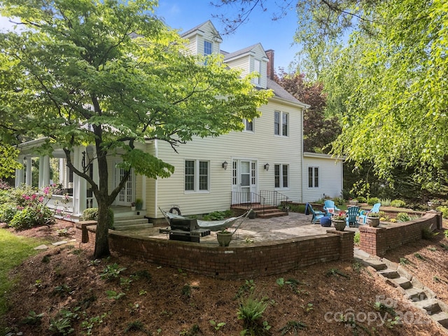 100 Poplar Spring Trl, Hendersonville, NC 28739 - rear view of property featuring a patio