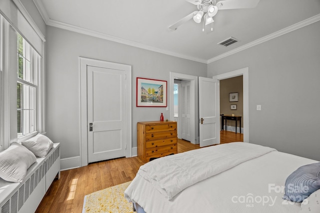 100 Poplar Spring Trl, Hendersonville, NC 28739 - bedroom with crown molding, wood finished floors, and ceiling fan