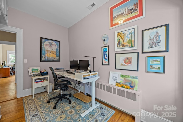 100 Poplar Spring Trl, Hendersonville, NC 28739 - office space featuring radiator and wood finished floors