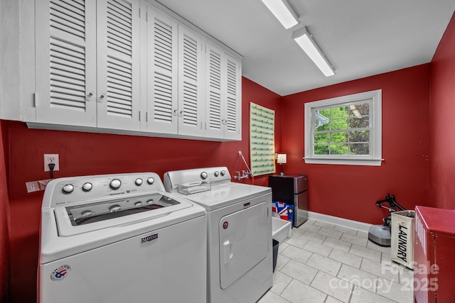100 Poplar Spring Trl, Hendersonville, NC 28739 - washroom with cabinet space, washing machine and dryer, and light tile patterned floors