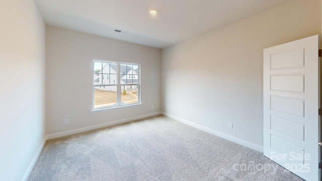 9612 Pointer Rd Unit 59, Huntersville, NC 28078 - carpeted spare room with baseboards