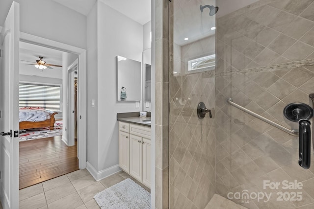 11621 Mount Argus Dr, Cornelius, NC 28031 - bathroom featuring plenty of natural light, a stall shower, vanity, and tile patterned flooring