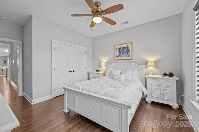 11621 Mount Argus Dr, Cornelius, NC 28031 - bedroom featuring dark wood finished floors, a closet, and ceiling fan