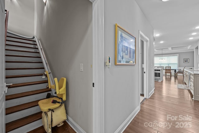 11621 Mount Argus Dr, Cornelius, NC 28031 - stairway featuring wood finished floors and recessed lighting