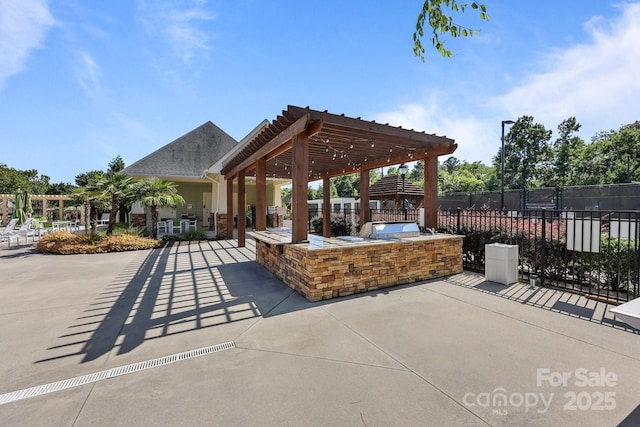 11621 Mount Argus Dr, Cornelius, NC 28031 - view of patio with an outdoor kitchen and a pergola